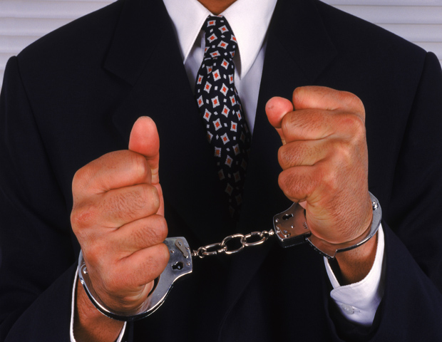 businessman with handcuffs